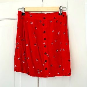 Mini length summery red skirt